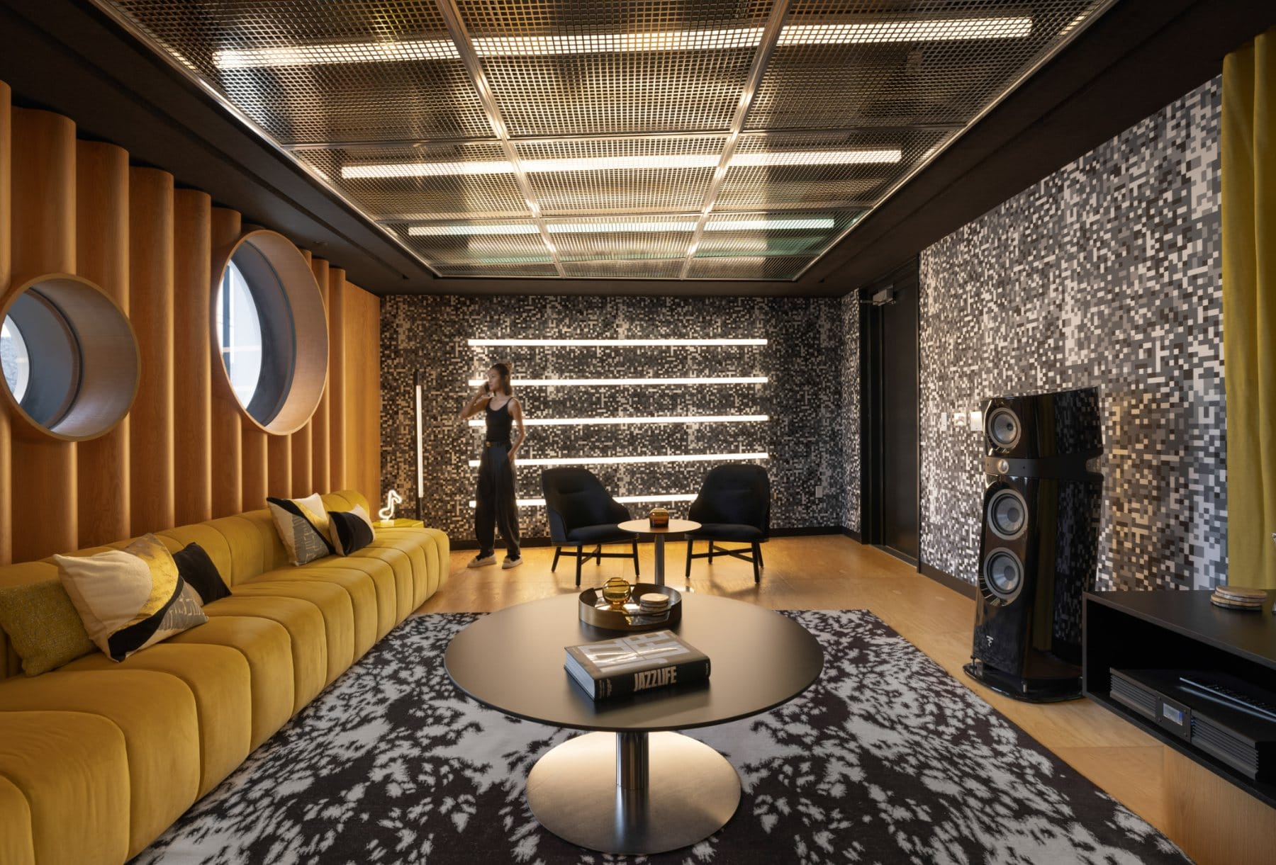 Coffee bar · the “REFRESH” canteen, anchoring the main street with brass mesh and warm pendants